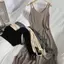 Mùa xuân hè 2026 Plus size Kích thước cực lớn 150kg Suspender Váy dài xẻ bên hông không tay béo mm Bao da thịt Slimer Look Casual Inner Bottoming Dress Nữ
