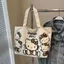 2025 Hoạt Hình Đi Lại Vai Tote HelloKitty Túi Vải Túi Tote Trang Điểm Lưu Trữ Túi Vải Nhỏ Di Động