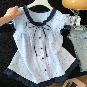 Áo sơ mi trẻ em màu sắc tương phản chấm bi ngọt ngào phong cách Hàn Quốc dành cho nữ mùa hè viền nấm buộc dây tay phồng giảm tuổi ngắn-