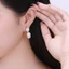 Hoa Tai nữ uốn mềm Timeless Touch mạ vàng cao cấp thanh lịch, sang trọng thiết kế hiện đại - DOJI