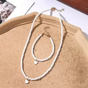 Mặt dây chuyền hạt giống thủ công Bohemian Chic dành cho nữ Nelace - Bộ phụ kiện xương đòn Boho màu trắng ngọc trai 2 chiếc [Mina]