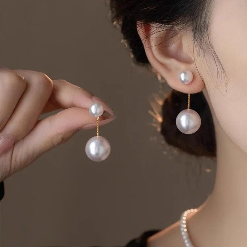 Bông tai ngọc trai hình trái tim, kiểu retro sang trọng, phù hợp với trang phục đơn giản