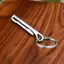 # HB # Ví dụng cụ bằng thép không gỉ Móc khóa đa chức năng Carabiner Kẹp tiền cần thiết Phụ kiện cắm trại ngoài trời.