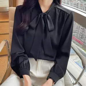 Áo sơ mi thu đông nữ phong cách Hàn Quốc, chất liệu satin với nơ đen.