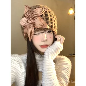 Mũ lưỡi trai dệt kim rỗng hoa ba chiều Nữ phiên bản Hàn Quốc Bầu không khí Mũ dệt kim nhìn mặt nhỏ Mũ chui đầu du lịch