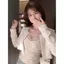 Quần áo mùa xuân 2026 Phong cách mới Hot Girl Pure Desire Style Suit Women Short Jacquard Cardigan Top + Áo Vest dây Bộ đồ hai mảnh