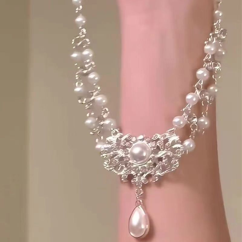 Nhẹ nhàng chuỗi xương đòn zircon và ngọc trai hai lớp tua rua, ánh sáng nhấp nháy, phong cách mới sang trọng