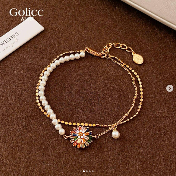 LẮC TAY GOLLIC NGỌC TRAI MIX CHARM HOA CÚC