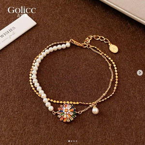 LẮC TAY GOLLIC NGỌC TRAI MIX CHARM HOA CÚC