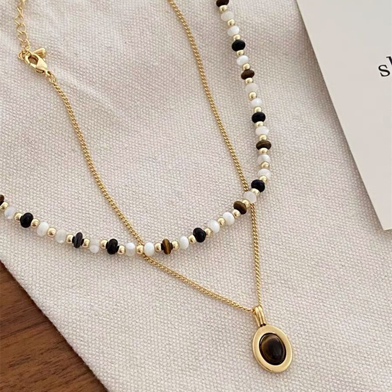 Vòng cổ nhiều lớp đính cườm đá mắt hổ Melard