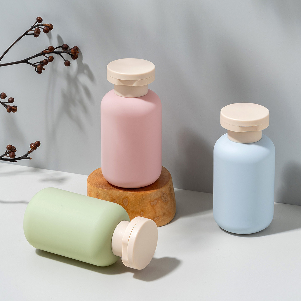 Chai du lịch di động 100ml Hộp đựng chất lỏng có thể đổ lại cho mỹ phẩm Gel tắm