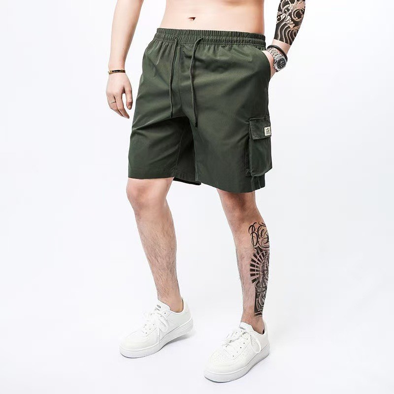 Quần short nam dáng rộng từ polyester, phong cách thể thao, thoáng mát dành cho mùa hè