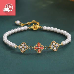 Tính khí thời trang mới phong cách Trung Quốc cỏ bốn lá ngọc trai nhiều màu sắc đơn giản đa năng vòng tay nữ