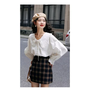 Áo sơ mi trắng phong cách Hàn Quốc ngọt ngào và preppy búp bê, thiết kế mới cho thu đông 2026