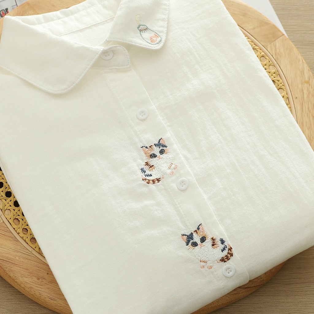 <![CDATA[Áo sơ mi nữ 100% sợi cotton cao cấp, hoạ tiết thêu hoạt hình mèo trắng]]>