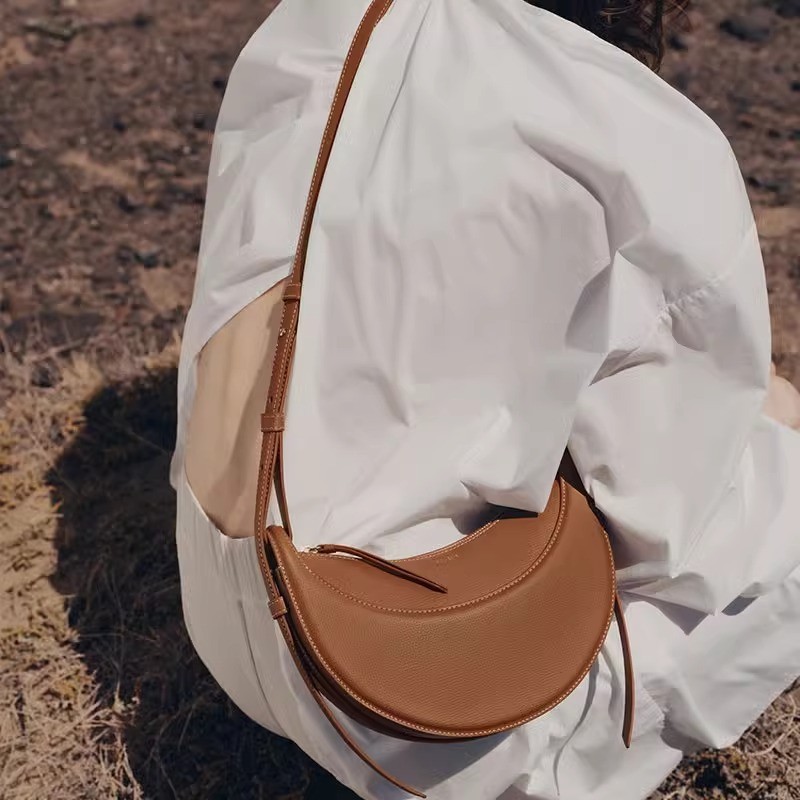 ANCO 2026 Túi da thật mới Túi lưỡi bằng da Saddle Bag Thiết kế vai kiểu Paris Túi nách Messenger cho phụ nữ
