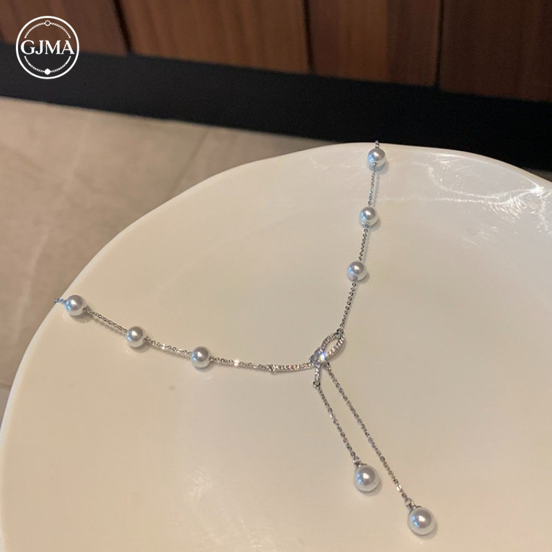 Vòng cổ tua rua với ngọc trai giả và nơ - Thiết kế cao cấp, phù hợp cho phụ kiện nữ sang trọng