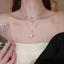 Vòng cổ 3 lớp hình trái tim với dây ngọc trai, phù hợp hẹn hò và dự tiệc