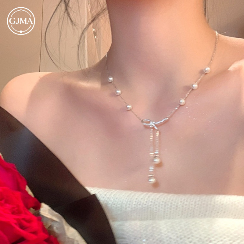 Vòng cổ tua rua với ngọc trai giả và nơ - Thiết kế cao cấp, phù hợp cho phụ kiện nữ sang trọng