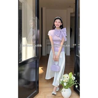 Áo sơ mi ren nơ lớn phối màu xanh tím, dáng slim-fit vai ngắn, size lớn phù hợp xu hướng xuân hè ngọt ngào