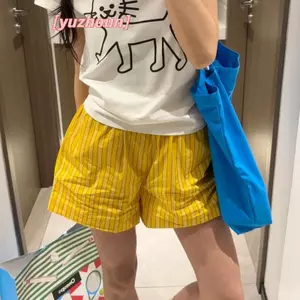 Quần short nữ màu sọc vàng, dáng rộng, eo cao, phù hợp thời trang thể thao mùa hè