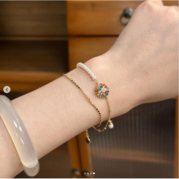 LẮC TAY GOLLIC NGỌC TRAI MIX CHARM HOA CÚC