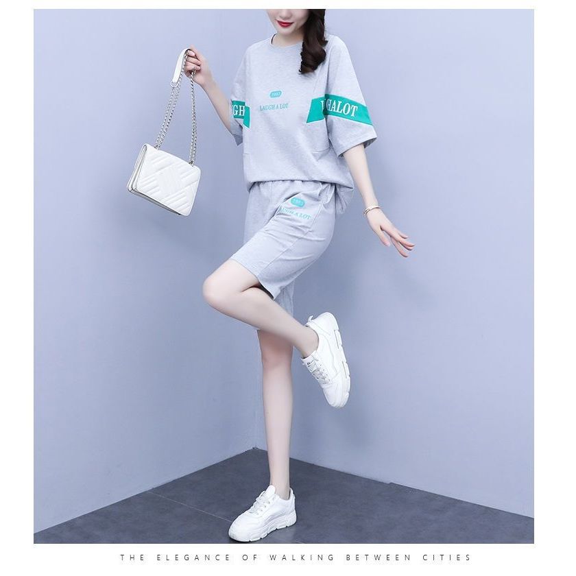 Bộ đồ thể thao dành cho nữ, bộ 2 mảnh gồm áo rộng ngắn tay và quần short rộng rãi, chất liệu vải Sợi Polyester