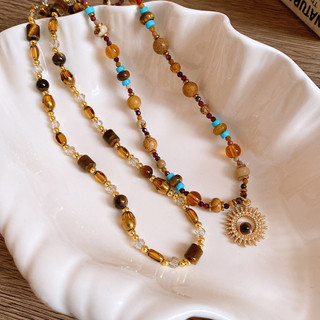 Dây chuyền vòng cổ bohemian hạt ngọc trai sang trọng với ánh sáng