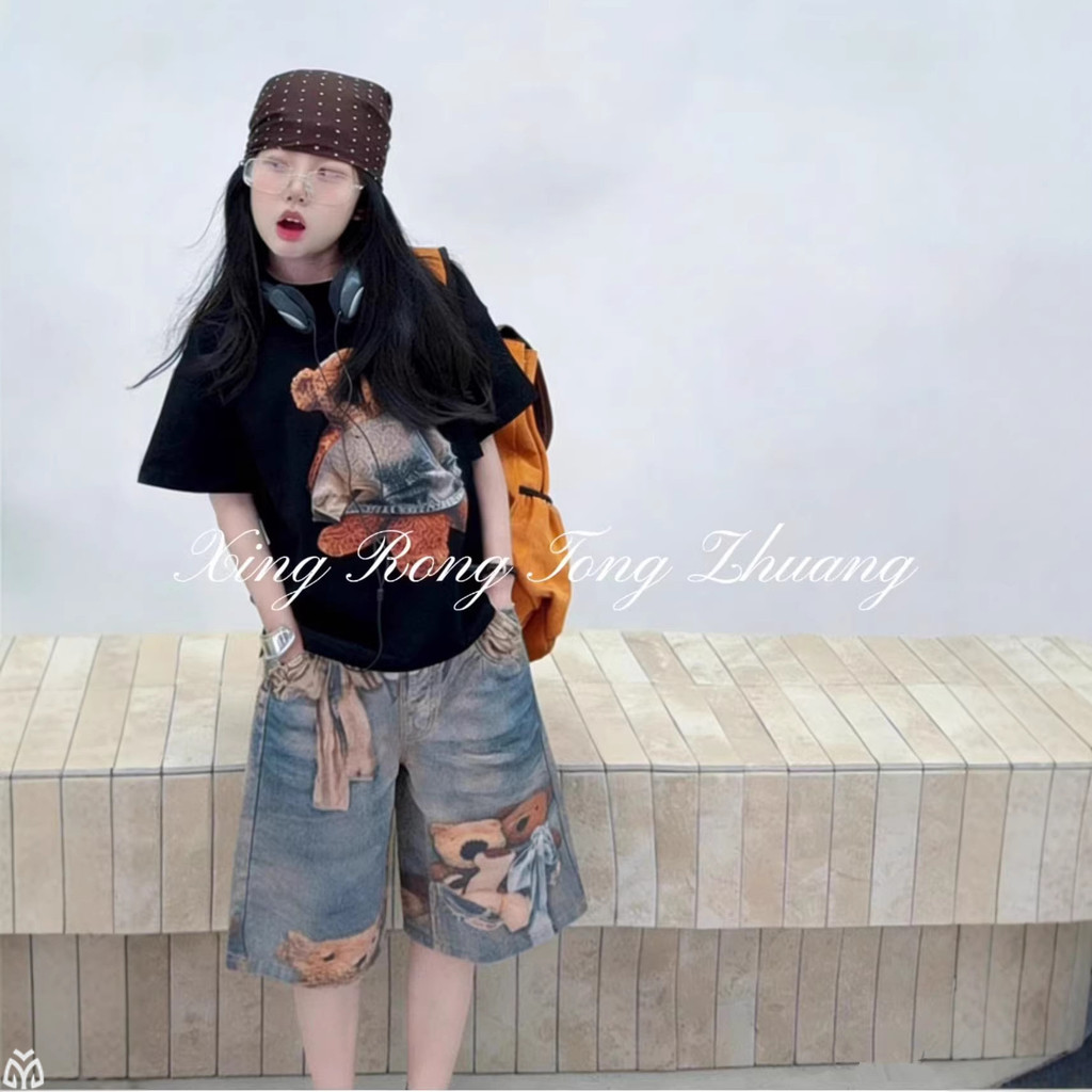Quần giữa Denim bé gái mùa hè 2026 Phong cách mới cho trẻ em Quần short in hình gấu kỹ thuật số