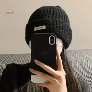 Mũ len tai mèo nữ phong cách Hàn Quốc, màu sắc đơn giản, phù hợp cho mùa thu đông.