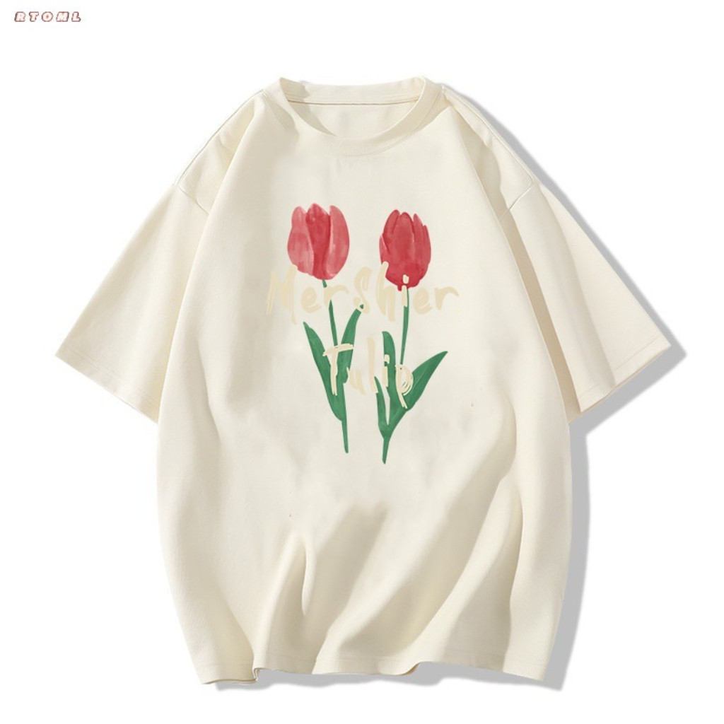 Áo thun nữ tay ngắn cổ tròn dáng rộng với họa tiết hoa tulip và các họa tiết khác.