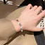 Vòng tay nữ đa năng với đá mắt mèo và zircon đen