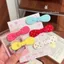 Kẹp tóc nơ màu tương phản Macaron