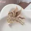 Áo len nữ thời trang với phụ kiện pha lê cánh ngựa thổ cẩm, phù hợp mọi dịp