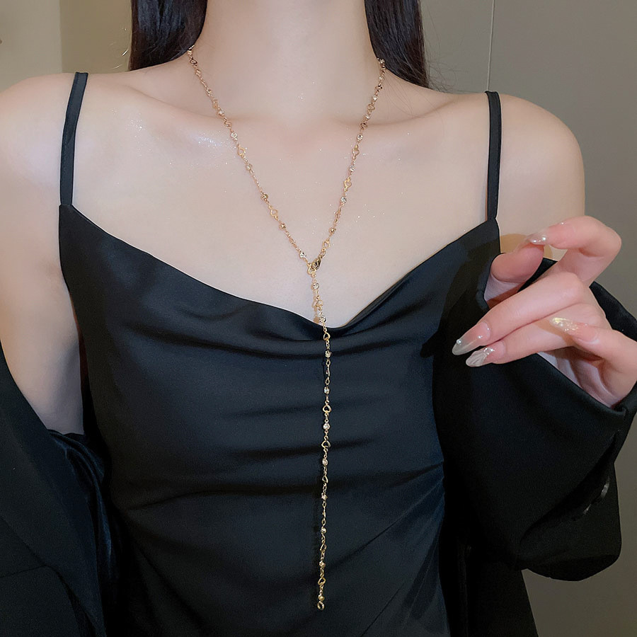 Vòng cổ nữ với liên kết kim cương giả và tua rua hình chữ Y thanh lịch, phù hợp cho cả tiệc tùng và hàng ngày