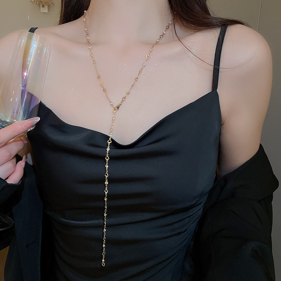 Vòng cổ nữ với liên kết kim cương giả và tua rua hình chữ Y thanh lịch, phù hợp cho cả tiệc tùng và hàng ngày
