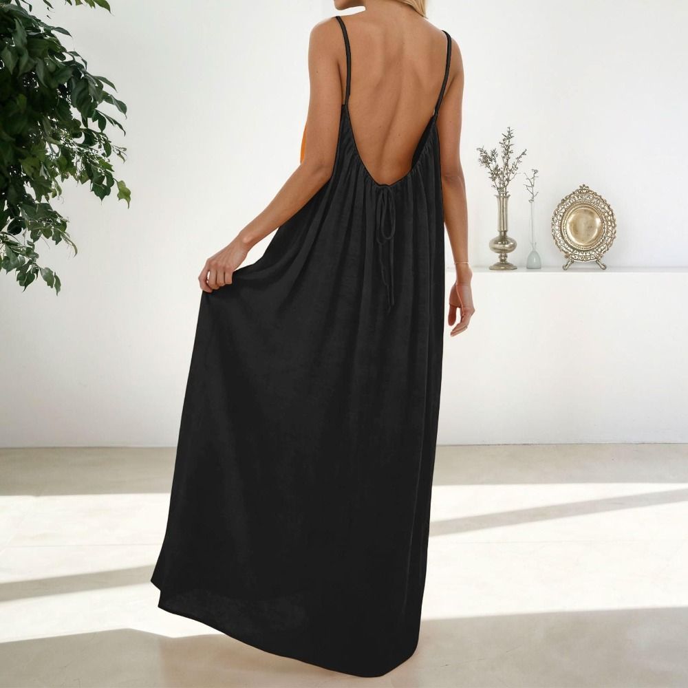 Váy Cami JUIC màu trơn, thiết kế hở lưng trendy, chất liệu mềm mại và thoải mái