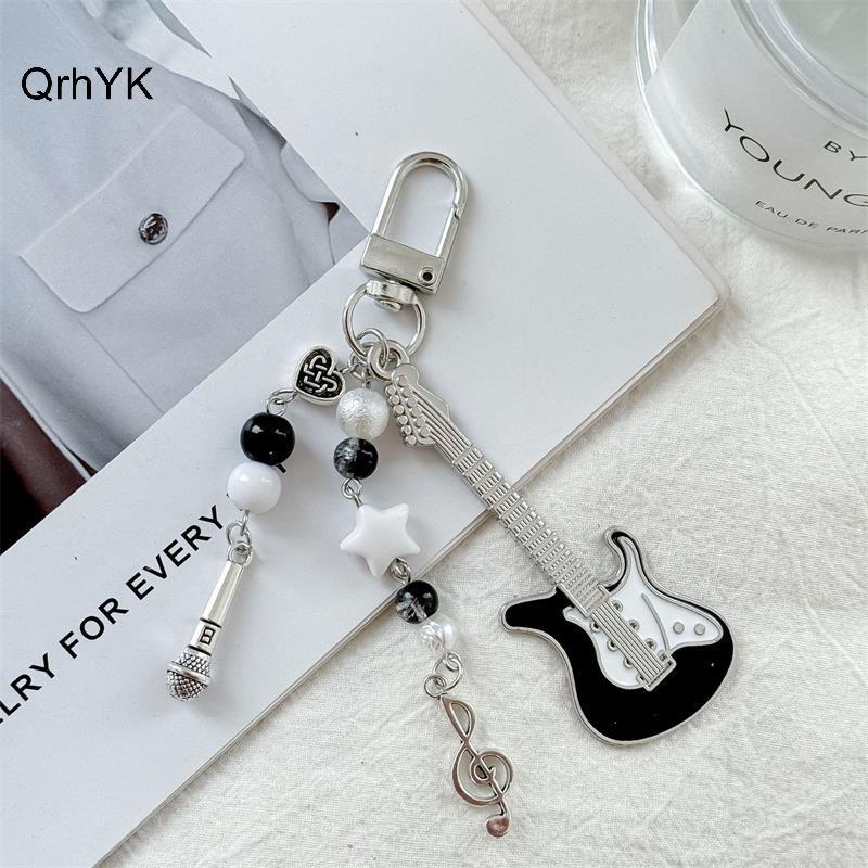 Thời Trang Nhà Máy Dễ Thương Đàn Guitar Micro Hạt Điện Thoại Di Động Dây Xích Quyến Rũ Ngọt Móc Khóa Bapa Âm Nhạc Note Mặt Dây Chuyền Túi Treo Trang Trí Cô Gái Quà Tặng QrhYK
