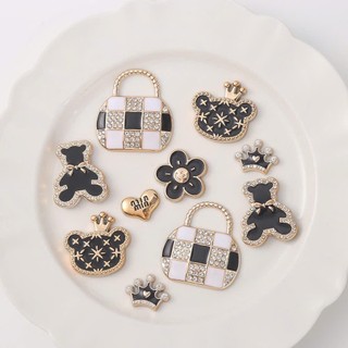 Set Charm Gấu Tiểu Thư Đính Đá Sang Trọng – Gấu Nơ Đen, Túi Caro, Vương Miện Luxury