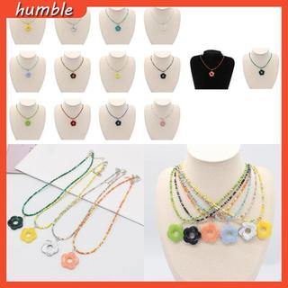 Vòng cổ handmade boho với hạt màu hoa và thiết kế xương đòn