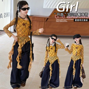 Áo thun dài tay thời trang cho bé gái Mùa xuân 2026 Phong cách mới Áo kẻ sọc trẻ em tua rua phong cách Hip-Hop hàng đầu