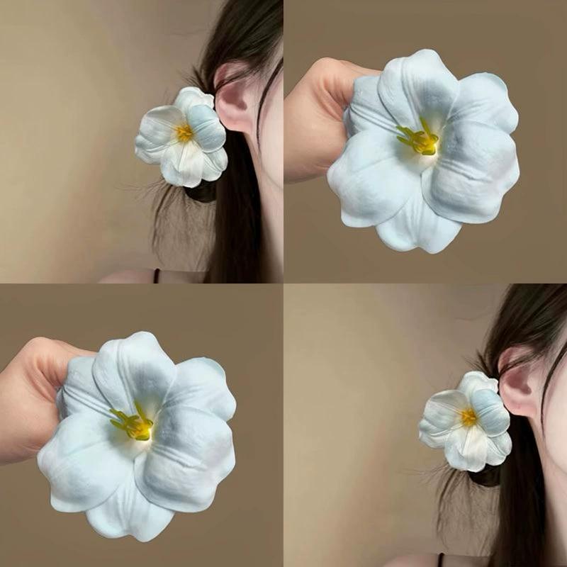 Mẹo tóc mô phỏng hoa màu xanh, phù hợp mùa hè và bãi biển