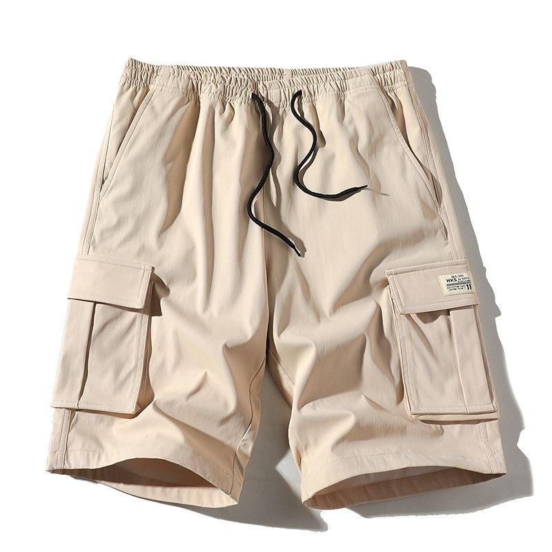 Quần short nam dáng rộng từ polyester, phong cách thể thao, thoáng mát dành cho mùa hè