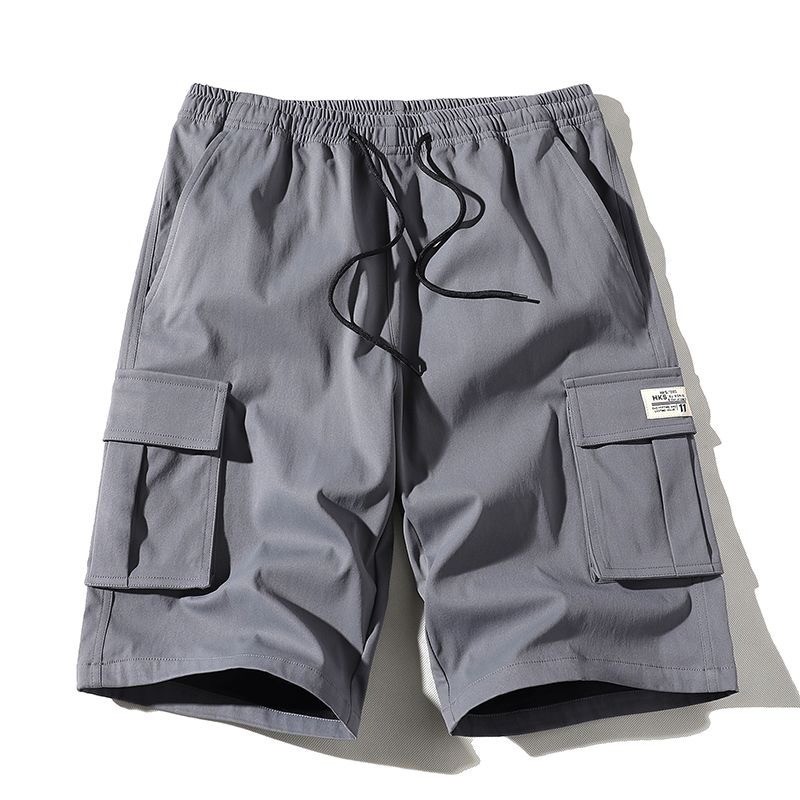 Quần short nam dáng rộng từ polyester, phong cách thể thao, thoáng mát dành cho mùa hè
