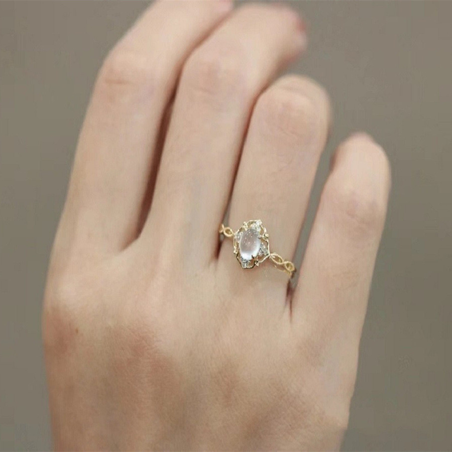 Nhẫn nữ đá mắt mèo vàng rỗng - Thời trang đa năng