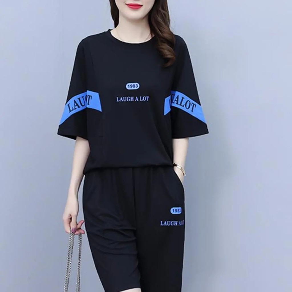 Bộ đồ thể thao dành cho nữ, bộ 2 mảnh gồm áo rộng ngắn tay và quần short rộng rãi, chất liệu vải Sợi Polyester