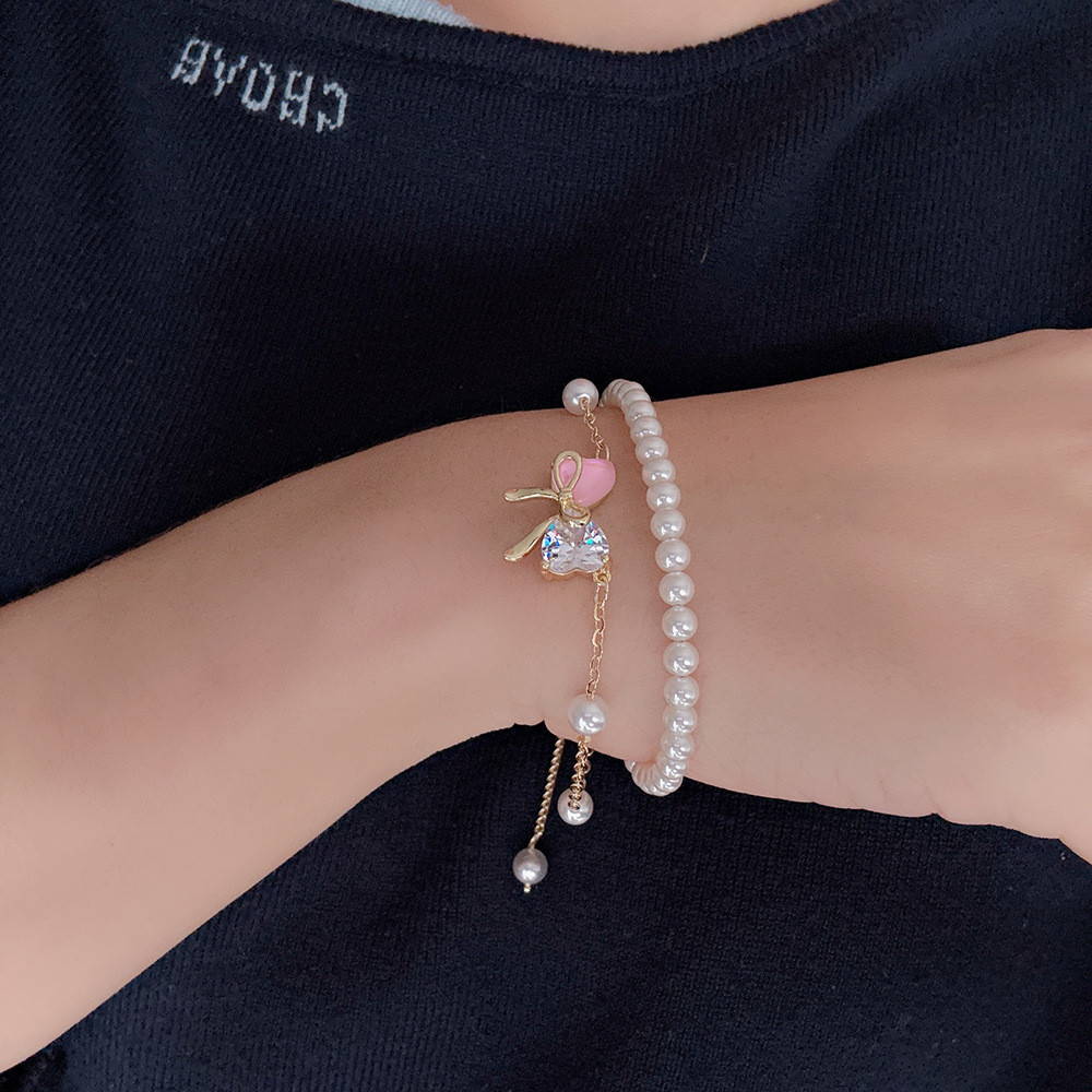 Vòng tay ngọc trai nơ hai lớp ngọt ngào