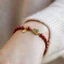 Vòng tay cinnabar thiết kế bầu, ngọc giả, đính cườm dành cho nữ
