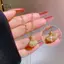 Mặt dây chuyền ngọc trai nữ với kim cương giả và vỏ titan bền bỉ từ PlumHOUSE