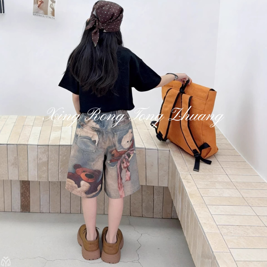 Quần giữa Denim bé gái mùa hè 2026 Phong cách mới cho trẻ em Quần short in hình gấu kỹ thuật số